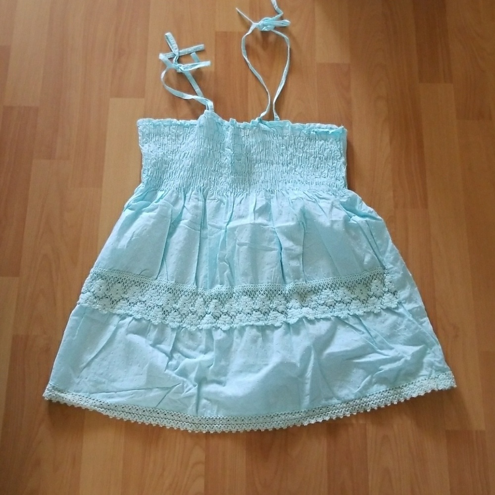 Light blue lace design top with strap ties